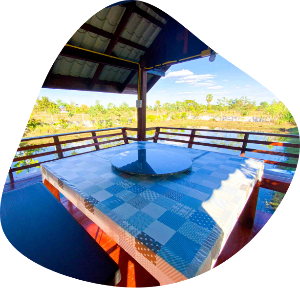 The relaxing and idyllic dining area with a view over the fish pond at The Better Life Place Rehab in Thailand.