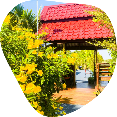 Secluded and lush garden with gazebo at The Better Life Place Rehab in Thailand.