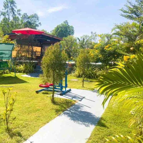 Lush garden at The Better Life Place Rehab in Thailand.