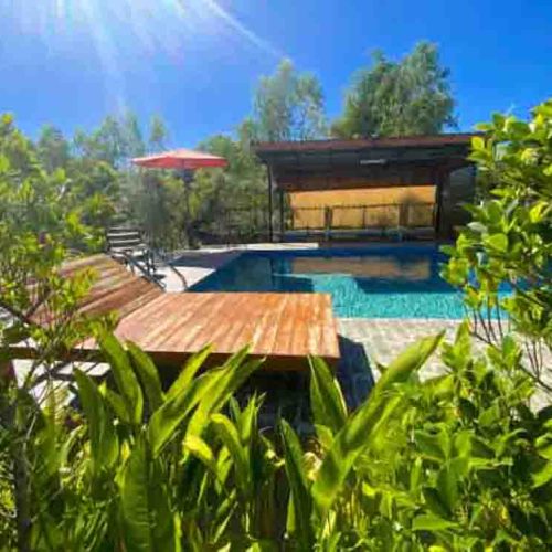 The relaxing swimming pool at The Better Life Place Rehab in Thailand.